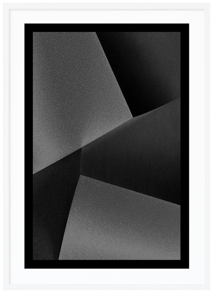 Black and white abstract and graphic items in different shades with a black border. White frame. 