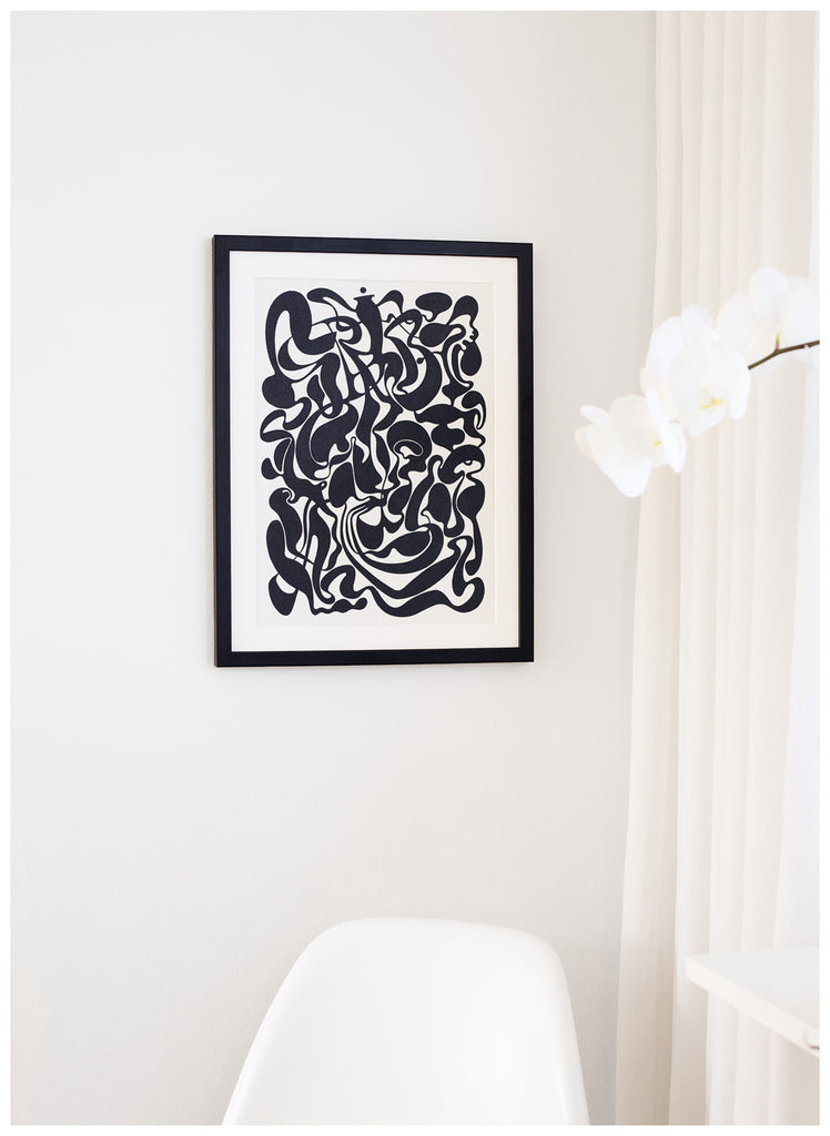 Black and white posters of abstract motifs. White frame. 