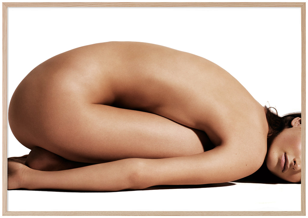 Poster of naked woman with belly lying against thighs. Oak frame. 