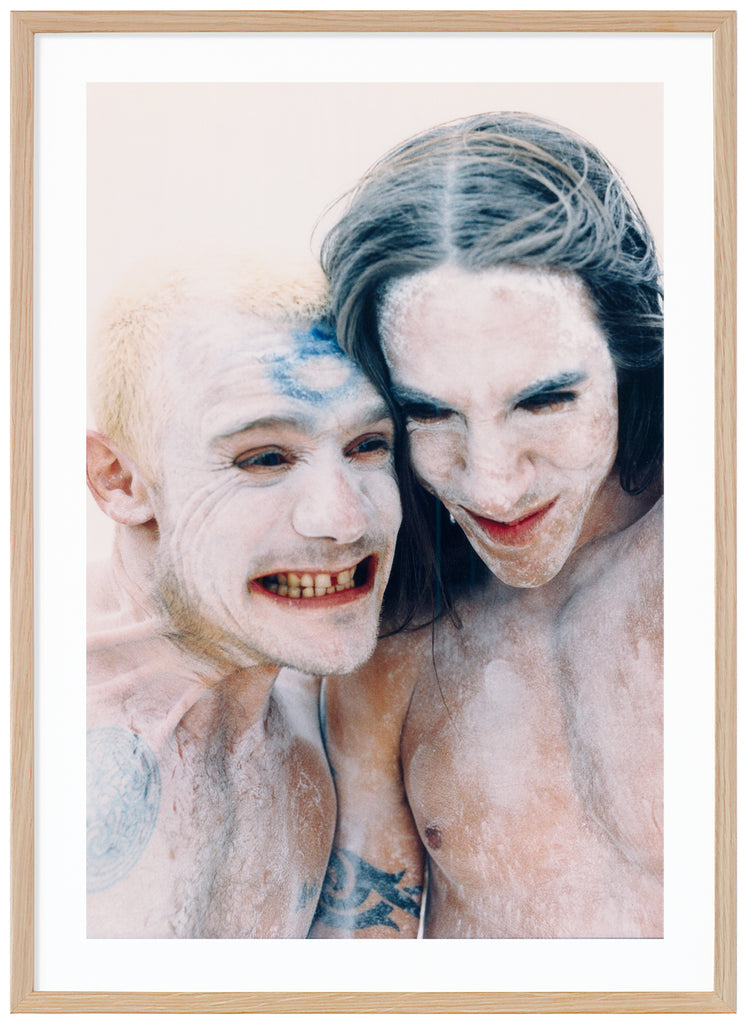 Flea and Anthony Kiedis from the Red Hot Chili Peppers portrayed. Oak frame. 