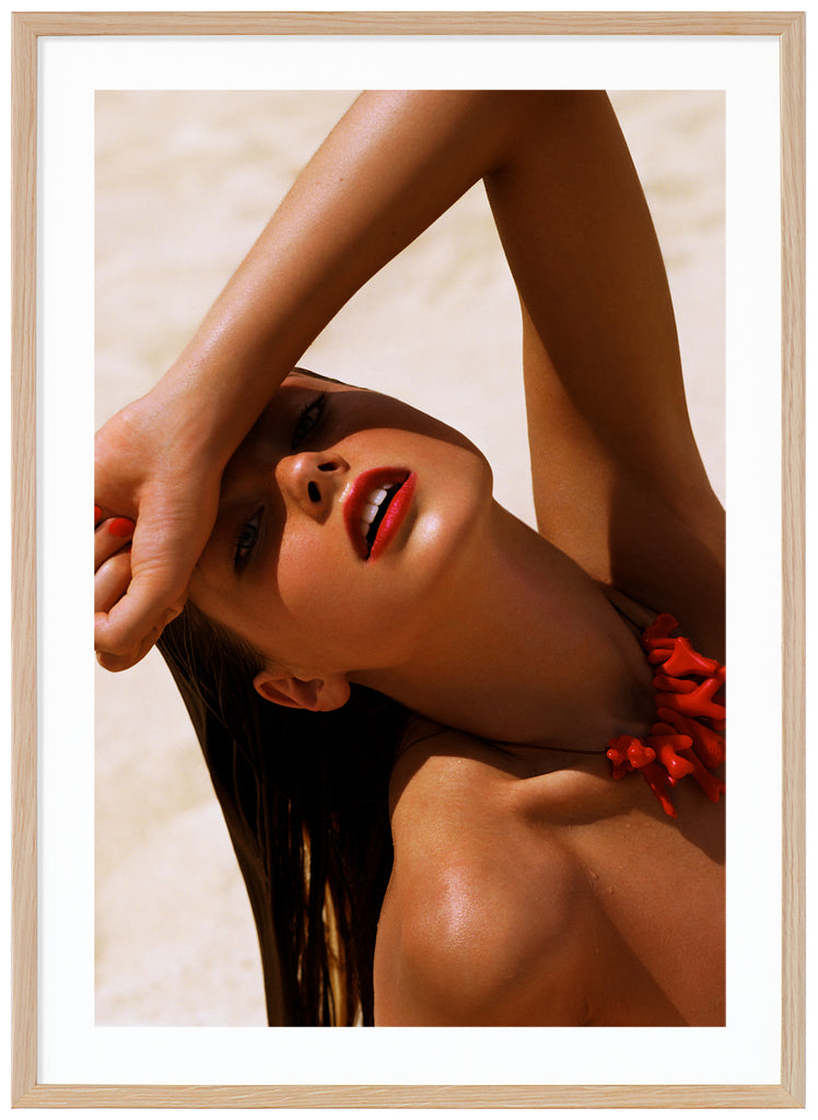 Photograph of a posed wet woman with red lips and top.  Oak frame.