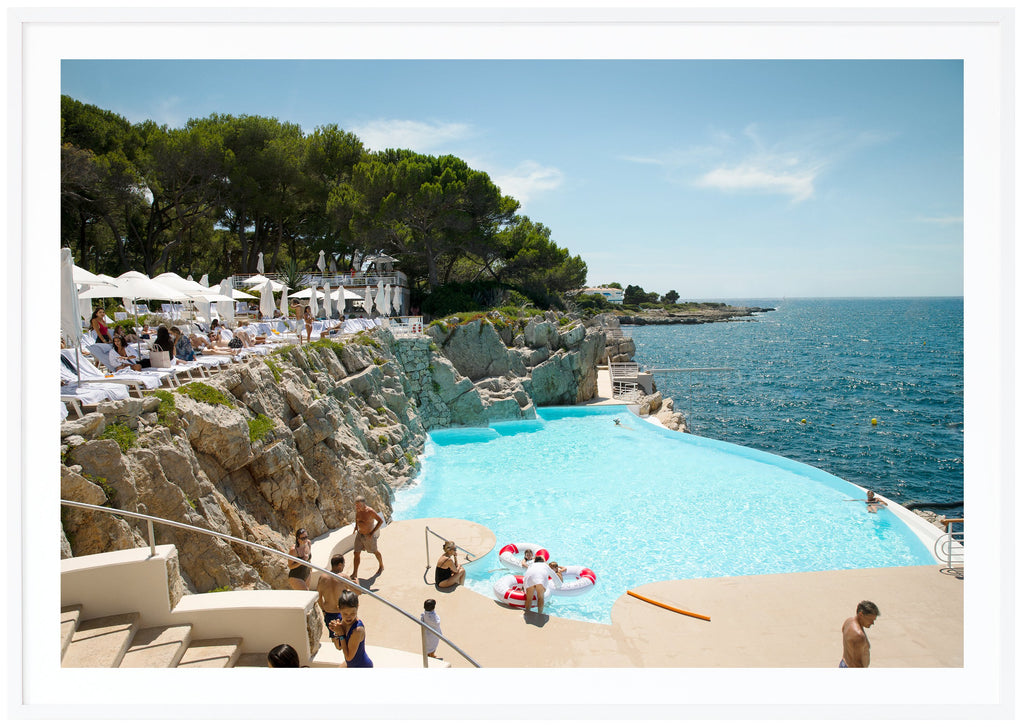 Color photograph of the pool at the mythical Eden Roc on the French Riviera. White frame. 