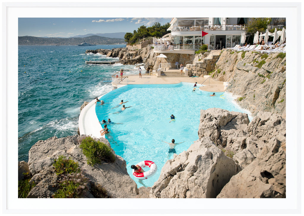 Color photograph of the mythical Eden Roc and Hotel du Cap on the French Riviera. White frame. 