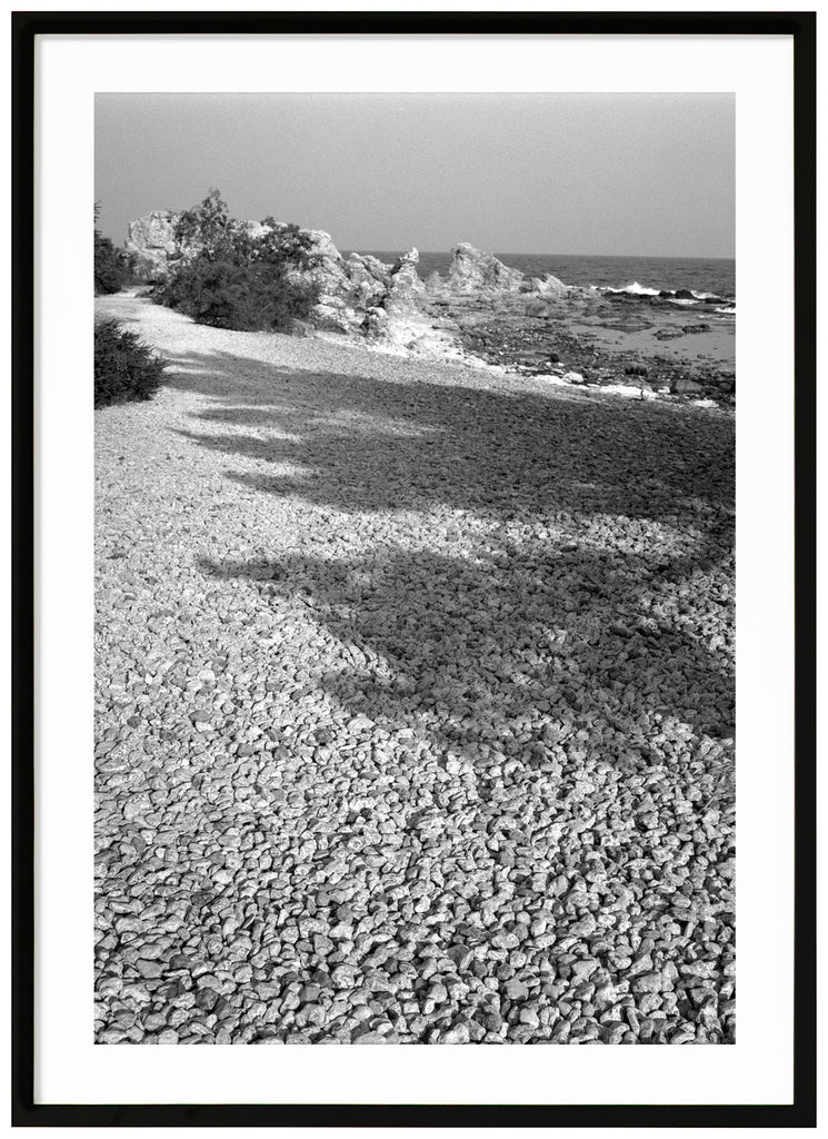 Analogous photography of Ljugarn on Gotland is a wonderful place with fun rauks.  Black frame. 