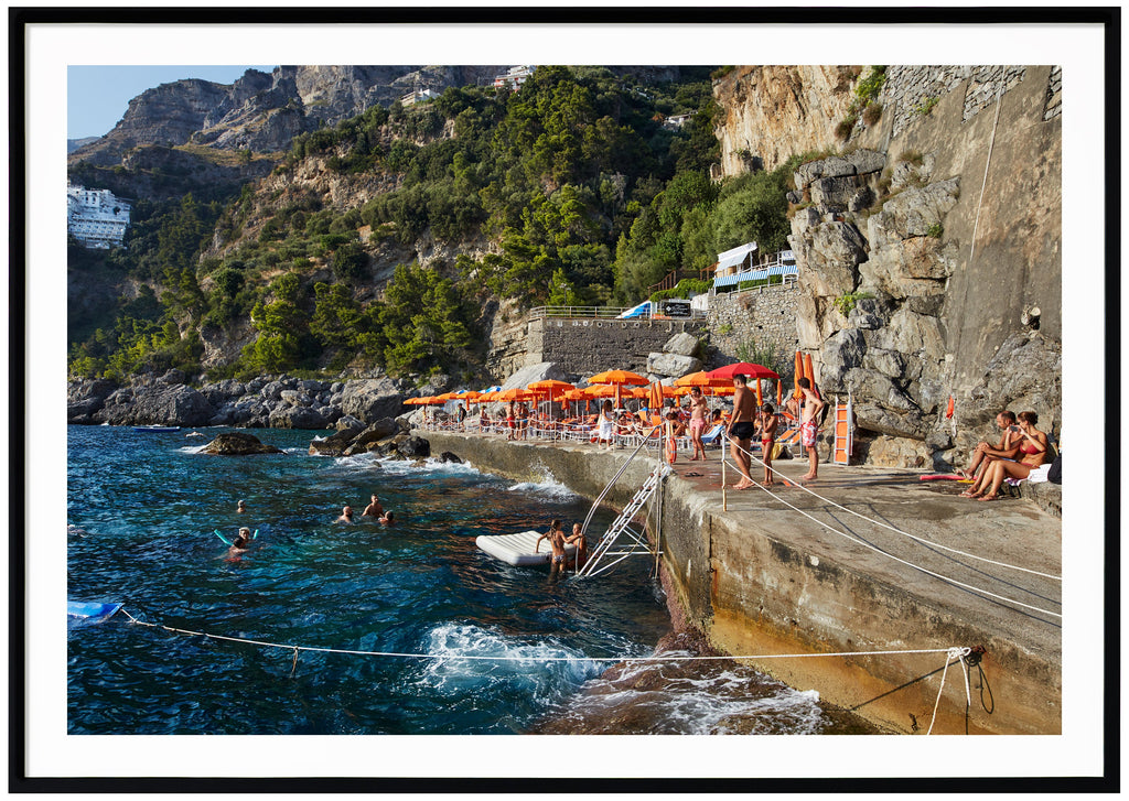 After a short boat ride from Positano, you arrive at One Fire Beach in Praiano.  Black frame. 