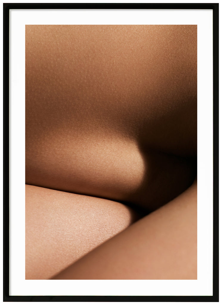 Abstract poster of skin with shadows. Black frame. 