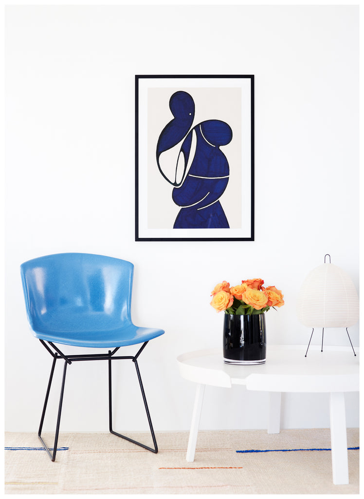Posters of blue abstract motifs. White background, by the Swedish artist Henrik Delehag.  White frame. 