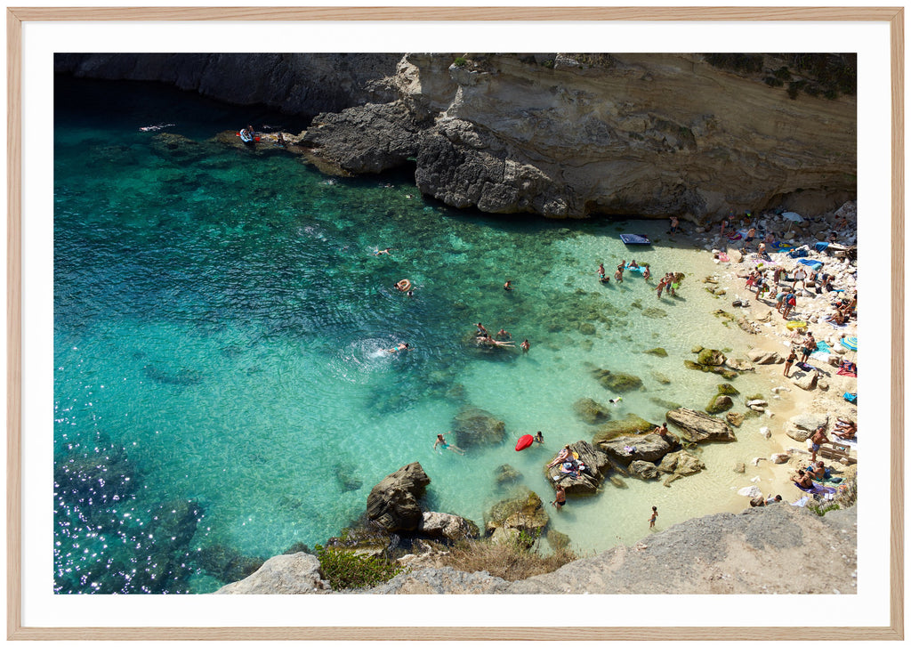 Posts of bathing place with people between rocks. Swimming people and floating mattresses. Oak frame. 