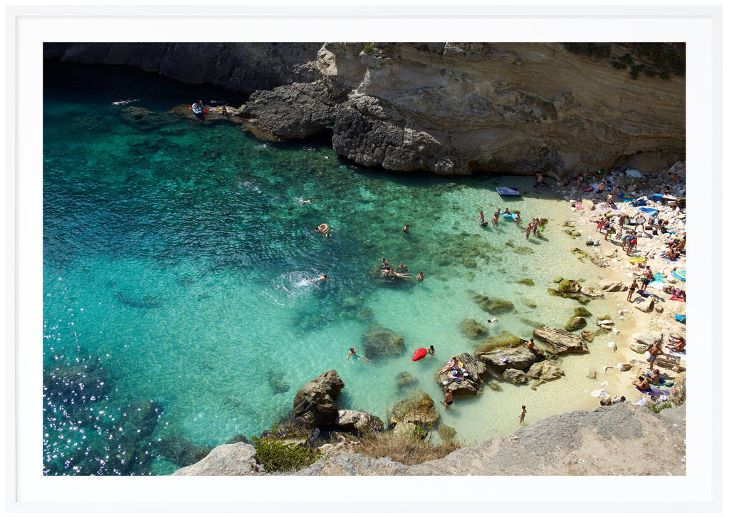 Posts of bathing place with people between rocks. Swimming people and floating mattresses. White frame. 