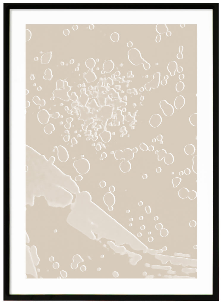 Posters of abstract motif in a beige monochrome tone. Black frame. 