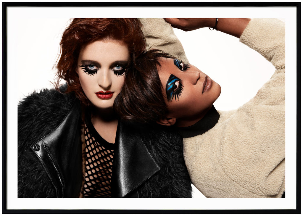 Poster of the pop duo Icona Pop photographed by John Scarisbrick. Black frame. 