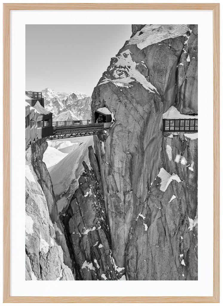 The dramatic view of the bridge atop the Aiguille du Midi in the French Alps. Oak frame. 