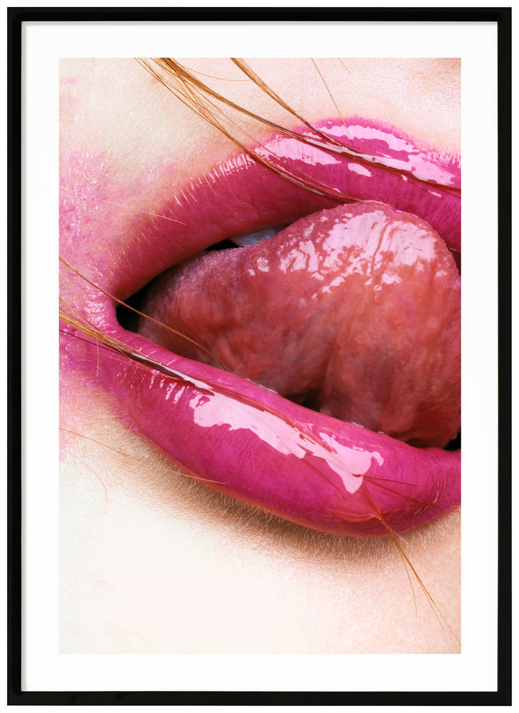 Photograph of close-up of pink lips licking on upper lip. Black frame.