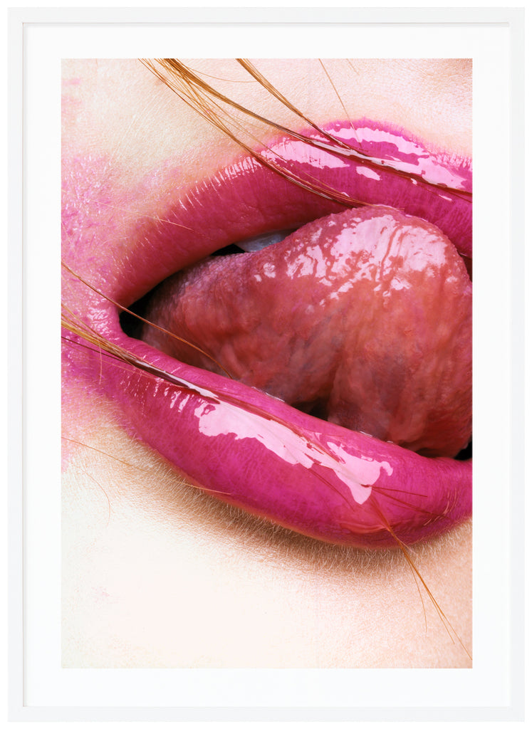 Photograph of close-up of pink lips licking on upper lip. White frame.