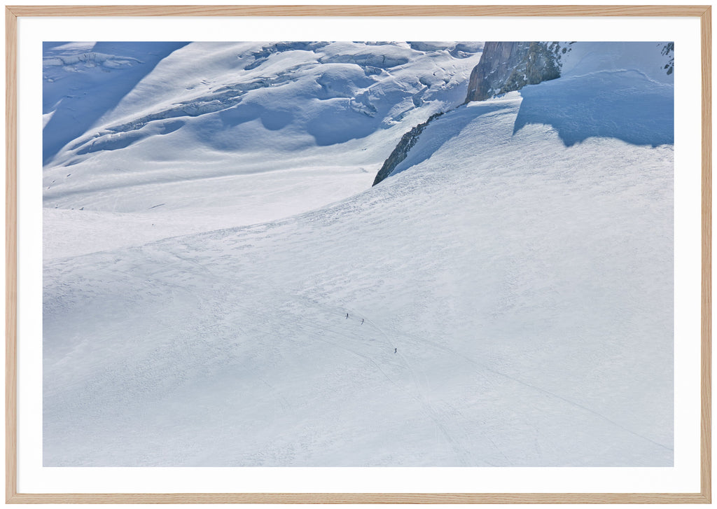 Color photography of a huge snow-covered surface, taken in the French Alps.  Oak frame. 