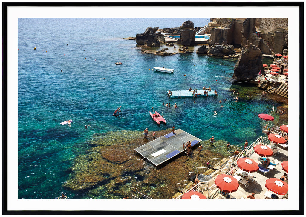 Photograph of a seaside resort in southern Italy. Black frame. 
