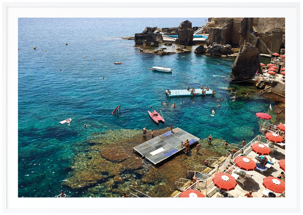 Photograph of a seaside resort in southern Italy. White frame. 