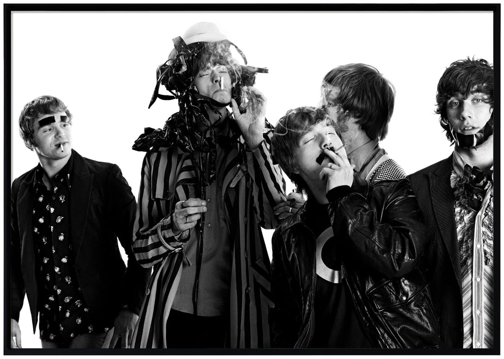 Black-and-white photograph of the rock band Mando Diao taken by Patrik Sehlstedt. Black frame. 
