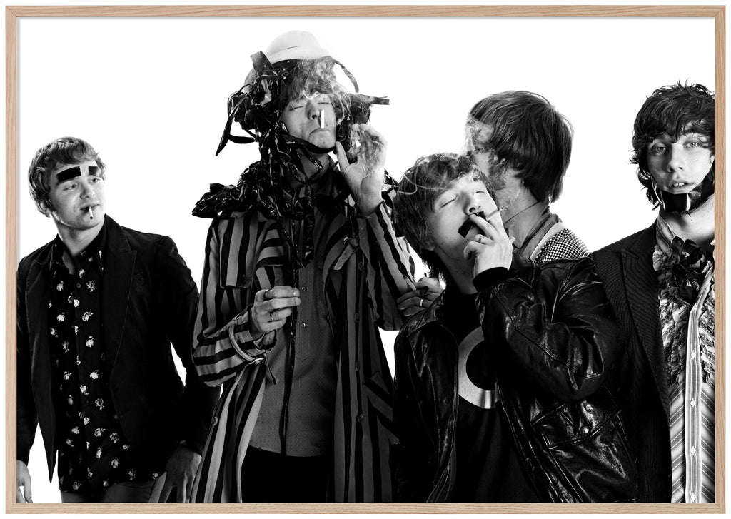 Black-and-white photograph of the rock band Mando Diao taken by Patrik Sehlstedt. Oak frame. 