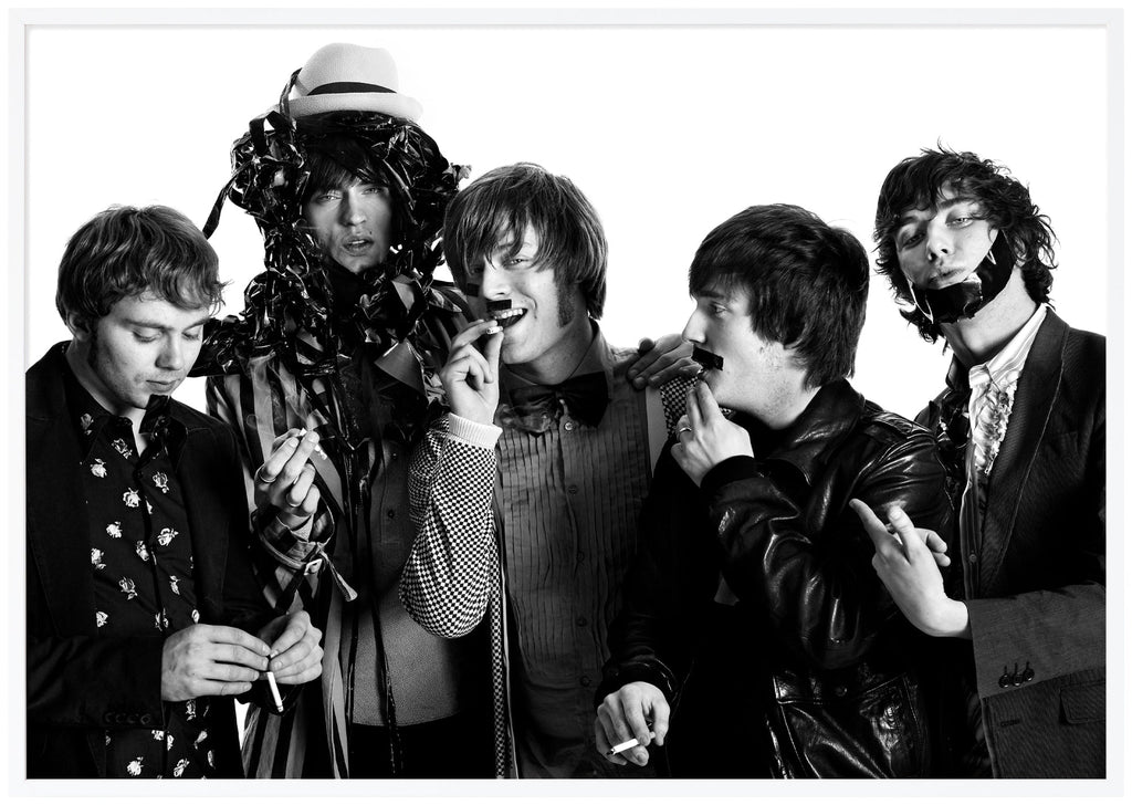Black and white photograph by Patrik Sehlstedt of the rock group Mando Diao. White frame.