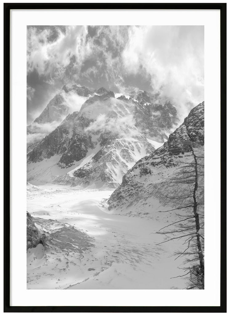 France's largest glacier Mer de Glace photographed in black and white. Black frame. 