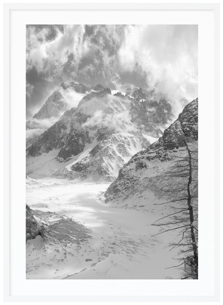 France's largest glacier Mer de Glace photographed in black and white. White frame. 
