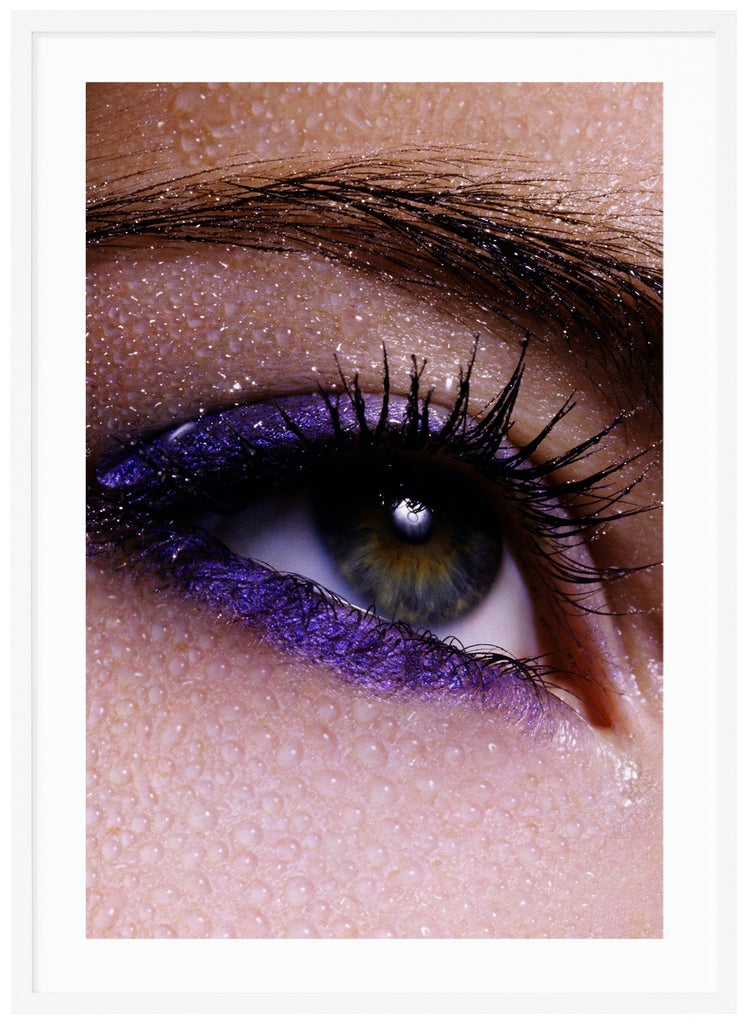 Posts of close-up of eye and eyebrows with purple makeup and water drops over the skin. White frame. 