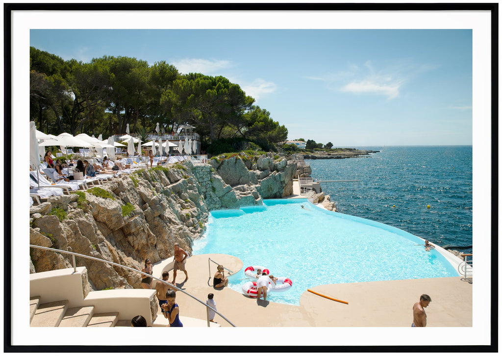Color photograph of the pool at the mythical Eden Roc on the French Riviera. Black frame. 