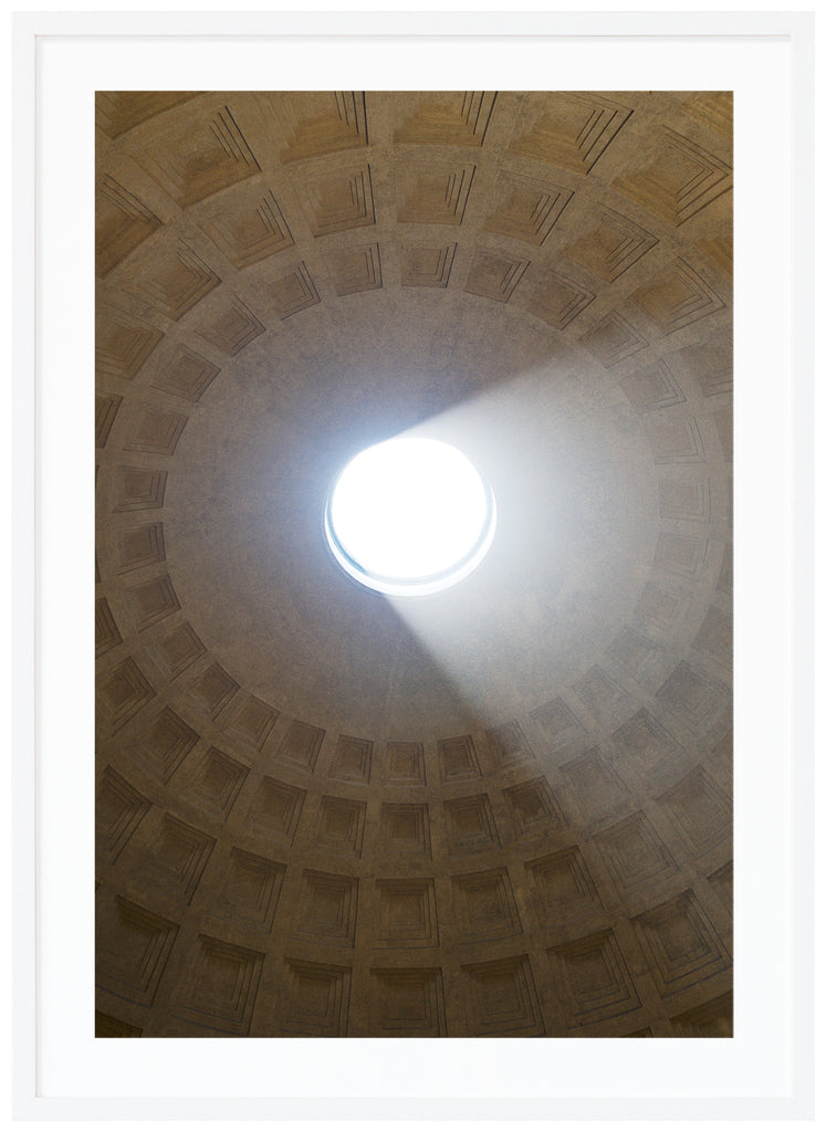 The oculus in the dome inside the Pantheon in Rome. The building was built in the years 115-125. White frame.
