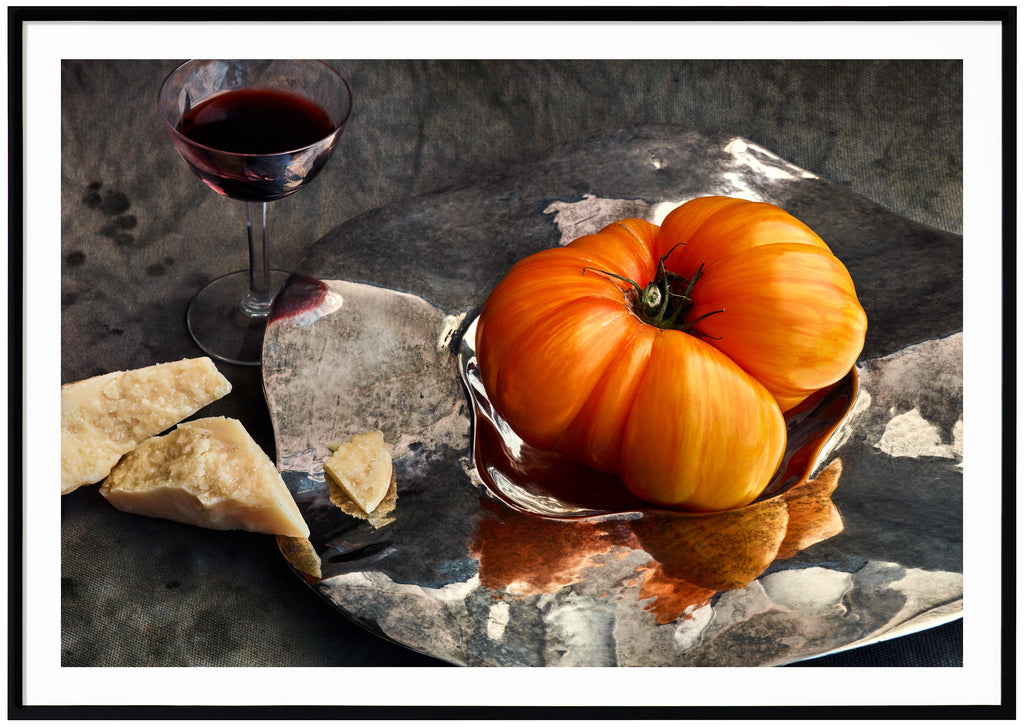 Still life in the color of a tomato, parmesan cheese and a glass of port wine. Black frame. 