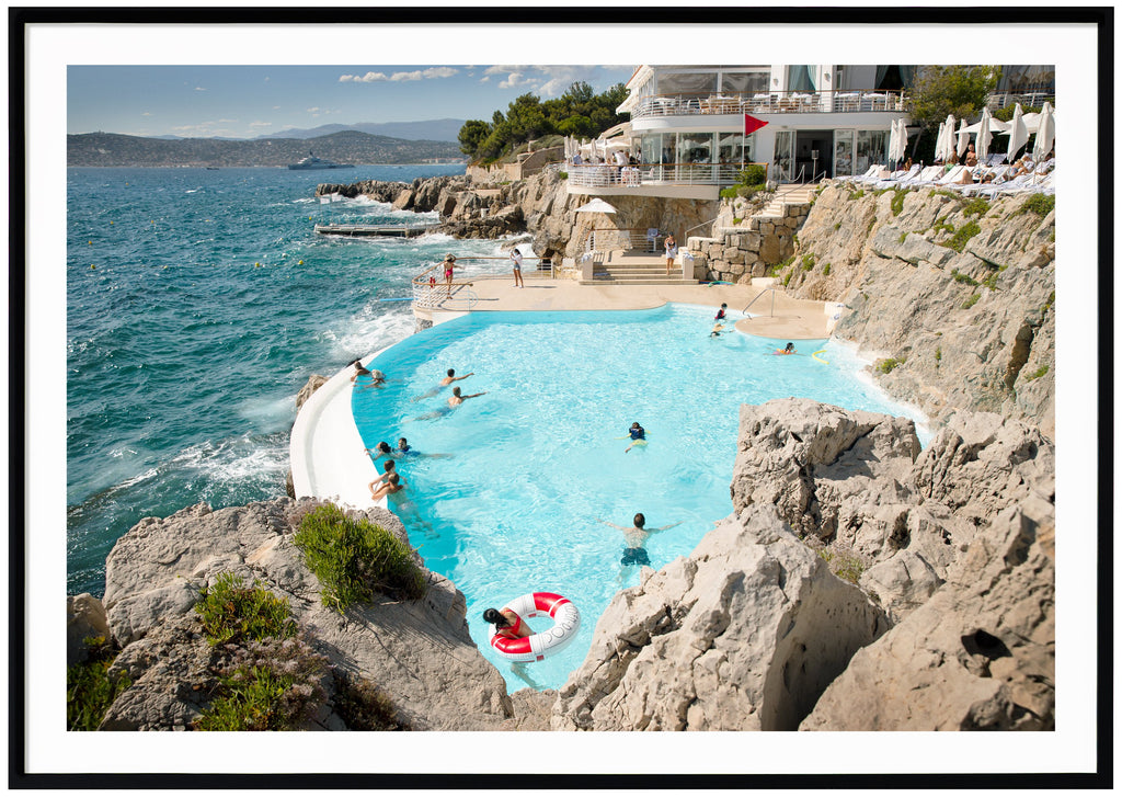 Color photograph of the mythical Eden Roc and Hotel du Cap on the French Riviera. Black frame.