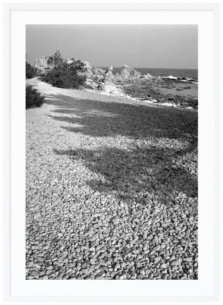 Analogous photography of Ljugarn on Gotland is a wonderful place with fun rauks.  White frame.
