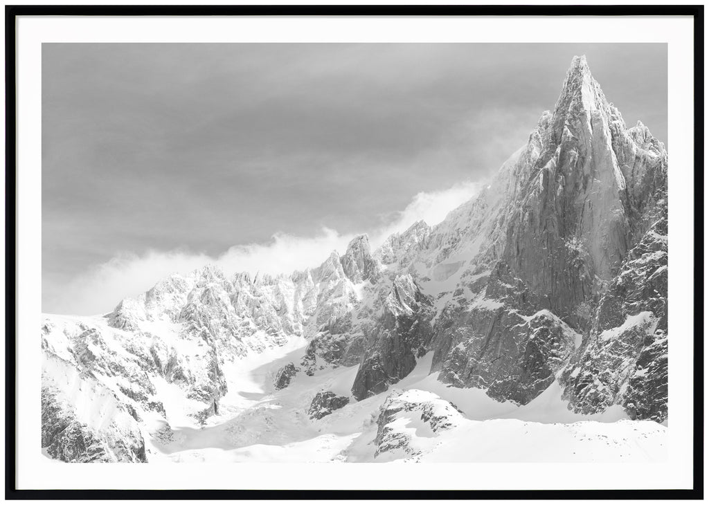 Black and white poster of high mountain with snow. Horizontal format. Black frame. 
