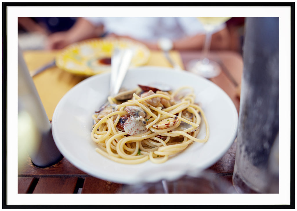 Color photography of one of the most classic dishes in Italy.  Black frame. 