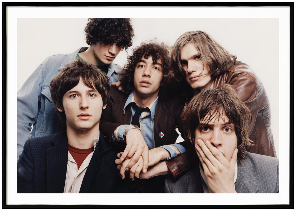 The American rock band The Strokes photographed in 2001 by John Scarisbrick in New York. Black frame.