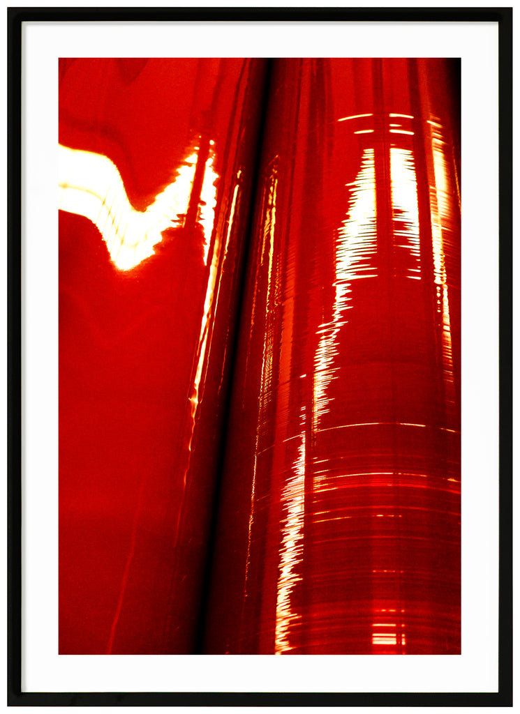 Abstract photo in red tones. Black frame. 